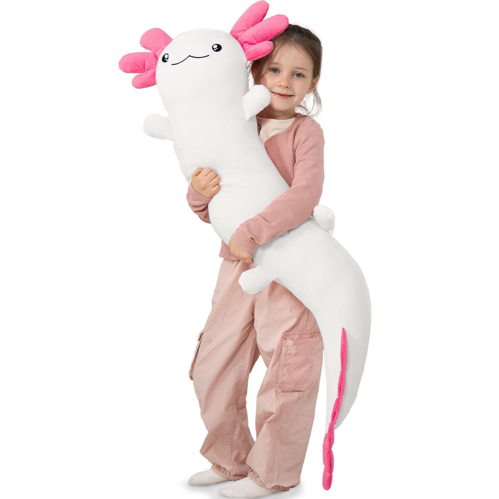 Child holding a large axolotl plush toy on a white background